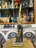 Pretty statue of Nefertem-God of healing-beauty-perfumes during the ancient Egypt-antiques-deities-Egyptian mythology-sculpture.
