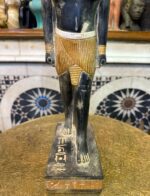 Pretty statue of Nefertem-God of healing-beauty-perfumes during the ancient Egypt-antiques-deities-Egyptian mythology-sculpture.