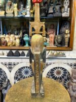 Pretty statue of Nefertem-God of healing-beauty-perfumes during the ancient Egypt-antiques-deities-Egyptian mythology-sculpture.